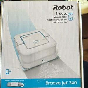 White iRobot Brava Jet 240 mopping robot new in sealed box.